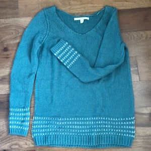 Teal sweater with with silver trim